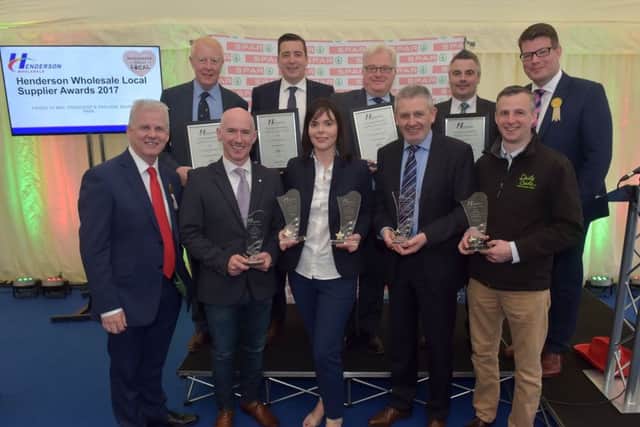 Winners and Highly Commended companies from the Henderson Wholesale Local Supplier Awards, including Daily Bake, K&amp;G McAtamney, Irwin's Bakery, Genesis Crafty, Around Noon, Hovis, Milgro and Moy Park, are pictured with Sales &amp; Marketing Director Paddy Doody and Fresh Foods Director Neal Kelly from Henderson Wholesale. The awards took place today (Friday 12 May) at Balmoral Show, rewarding the produce and practices of the food producers, farmers and growers in Northern Ireland. Photo by Simon Graham
