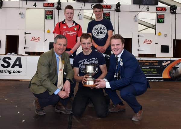 Andrew Rea (front row middle) from Straid YFC was awarded first place in the YFCU Sheep Shearing Novice Competition. Stephen Wilson from Gleno Valley YFC (back row left) was awarded second place while Alexander Butler from The Glens YFC (back row right) was awarded third place. Also pictured is YFCU president James Speers (front row right) and David John from sponsor, Lister Shearing (front row left)