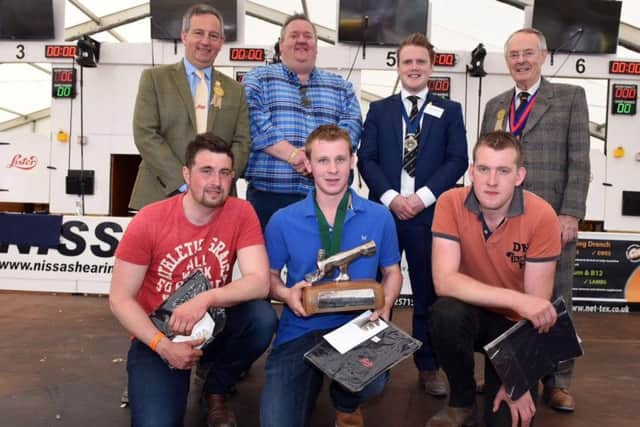 Front row middle: Jason McNeice from Collone YFC who came first in the YFCU Advanced Sheep Shearing Competition. Sean McCollum, The Glens YFC (front row left) was awarded second place and Jonathan McKelvey, Derg Valley YFC (front row right) was awarded third place. Also pictured back row is (left to right) is David John, from sponsor Lister Shearing, Patrick Allen from Moira Equestrian Centre who provided a cash prize for the best shorn pen of sheep to Jonathan McKelvey, Derg Valley YFC (who also came third in the advanced section), YFCU president James Speers and Andrew Dawson, Court Assistant The Worshipful Company of Woolmen, who also sponsor the competition