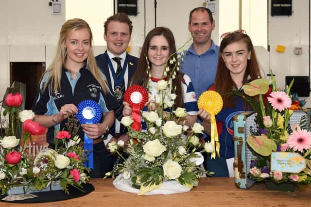Pictured are the 16-18 age category winners in the YFCU floral art competition. From left-right: Second place winner, Katie Lemon, Ballywalter YFC, YFCU president James Speers, first place winner, Claire Adams, Lisnamurrican YFC, Stephen McGill, commercial manager from sponsor, Tesco NI, and third place winner, Rebecca Ewing, Seskinore YFC