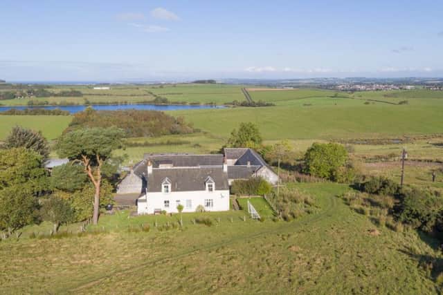 Whitehill Farmhouse, a three-bedroom property, sits at the centre of the farm