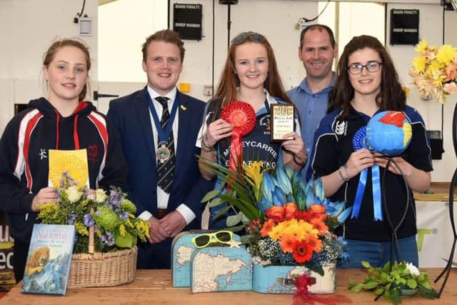 Pictured are the 14-16 age category winners in the YFCU floral art competition. From left-right: Third place winner, Georgina Annett, Rathfriland YFC, YFCU president James Speers, first place winner, Rachel Boyce, Garvagh YFC, Stephen McGill, commercial manager from sponsor, Tesco NI, and second place winner, Rachel McConnell, Straid YFC
