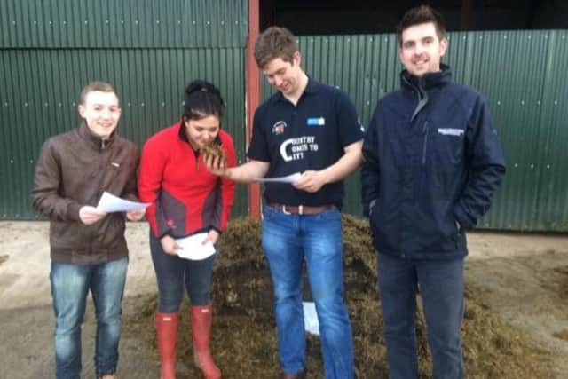 Lewis Crockett, Emma Duffy, Gordon Crockett and Thompson silage sponsor at the Co Londonderry stockjudging and silage assessment