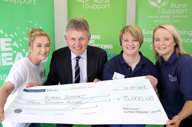 Pictured L-R is Deborah Cummings, UFU; Barclay Bell, UFU President; Melissa Wylie, Rural Support and Deborah Gavin, Rural Support receiving a cheque Â£3,000 from the Ulster Farmers Union.