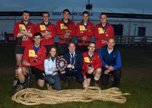 Tug of war advanced winners: The winners of the 2017 Advanced tug of war competition, Derg Valley YFC, are pictured with Denise Rafferty from sponsor John Thompson and Sons Ltd and YFCU president James Speers