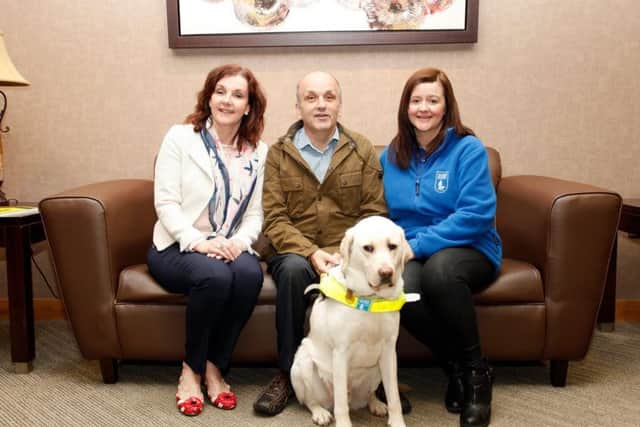 Show secretary Michele Doran pictured with Guide Dogs for the Blind representatives discussing plans for the show. The Lurgan Show will be supporting this charity