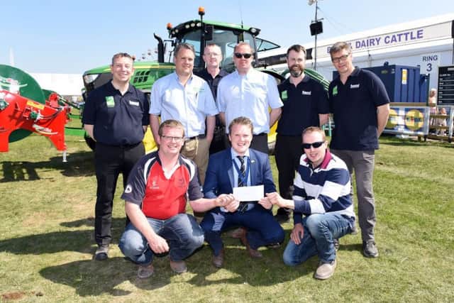 Pictured receiving their second place prize in the YFCU machinery handling competition are county members  and  from  YFC with YFCU president, James Speers, Gethin Jones, sponsor from Johnston Gilpin and Co, and Paul Kelly, HSENI. Also pictured are representatives from Johnston Gilpin and Co and HSENI.