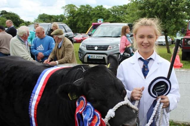 Martina O'Kane, from Dunloy with the Beef Inter-Breed Champion at Ballymoney Show 2017