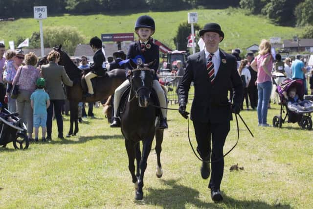 John Kelleher and his daughter Ashling of Macroom, Co Cork, with Cosford Pernilla after winning second place novice at the Cork Summer Show 2017. Picture: Clare Keogh