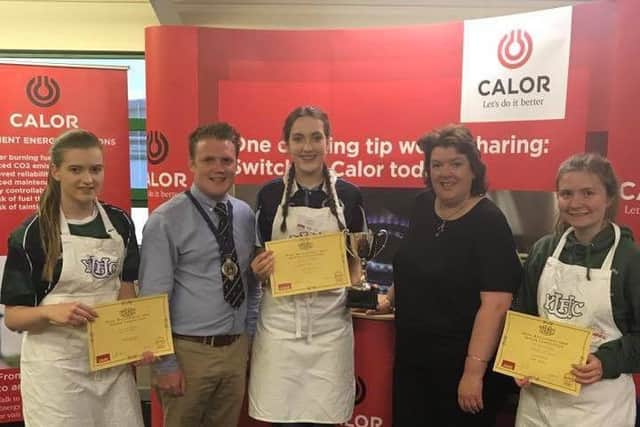 Winner of the junior category in the YFCU home management final 2017 was Caroline Barr from Garvagh YFC (middle). Second place winner Nicola Mitchell from Annaclone and Magherally YFC (pictured left) and third place winner Rebecca McCormick from Newtownards YFC (far right) with judge Paula McIntyre and James Speers, YFCU president