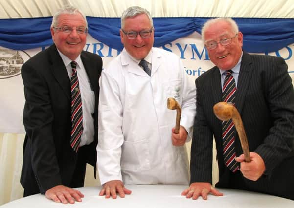 Pictured left to right are: Hamish McCall, managing director of Lawrie and Symington; the Cabinet Secretary for the Rural Economy Mr Fergus Ewing, and Brian Dickie, chairperson of Lawrie and Symington