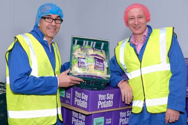 Angus Wilson, CEO and Lewis Cunningham, Managing Director of Wilson's Country with some of their 'You Say Potato' range. Photograph: Columba O'Hare