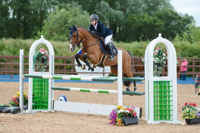 Max Wachman riding Cesha Old, winners of the 1.10m/1.15m Children on horses