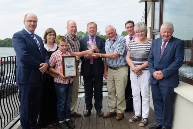 Keith and Robin Crawford, Cookstown,  were the overall Northern Ireland Runners-Up in the Lakeland Dairies Milk Quality Awards.  They were presented by Irish Agriculture Minister Michael Creed. Pictured (l to r) are: Michael Hanley, Group CEO, Lakeland Dairies; Linda and Keith Crawford with son Timothy; Minister Creed; Robin and Doreen Crawford with Colin Kelso, Vice-Chairman and Alo Duffy, Chairman of Lakeland Dairies.