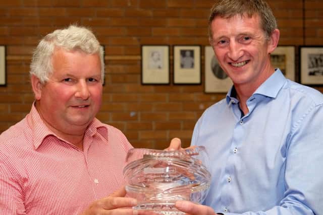 Robert McCullough, right, Head of Agribusiness, Danske Bank, presents a crystal award to Eric McClelland, Katesbridge, winner of Best Small Herd at the NI Aberdeen Angus Club's Herd Competition.Picture: Columba O'Hare