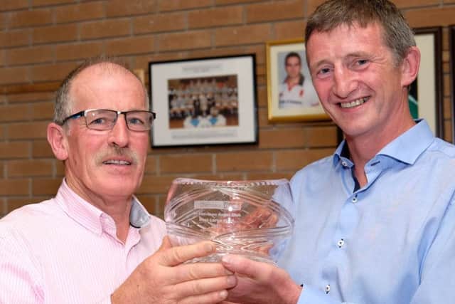 Robin Lamb's Richhill Herd took the award for the best large herd in the NI Aberdeen Angus Club's Herd Competition. Robert McCullough, right, Head of Agribusiness, Danske Bank, sponsor, is pictured presenting the crystal trophy. Picture: Columba O'Hare