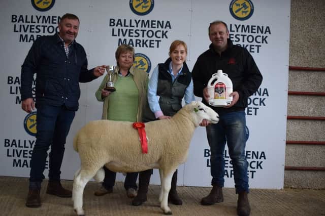 Judge John Morton, Penrith, Jayne and Catherine Kennedy with Crystalyx Cup for best Shearling Ram and  Matthew Cunning, from Connons General merchants,  Sponsor