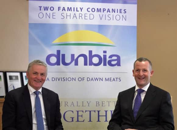 Jim Dobson (l) and Niall Browne (r) unveil the new look for the Dawn Meats and Dunbia UK joint venture, which will trade as Dunbia