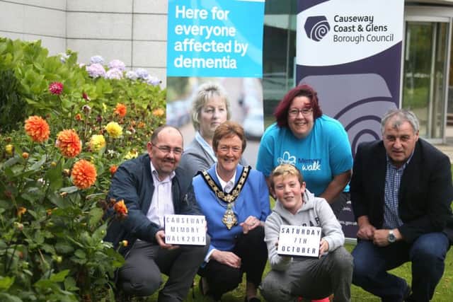 At the launch of The Causeway Memory Walk which takes place on Saturday 7th October in aid of the Alzheimers Society are Adrian Friel, Alzheimers Society Services Manager, the Mayor of Causeway Coast and Glens Borough Council, Councillor Joan Baird OBE, local Alzheimers Society supporter Elaine Dixon, her son Adam Dixon and Maurice Bradley, MLA