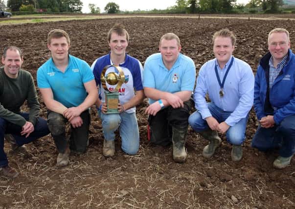 Left to right: Stephen Magill from competition sponsor Tesco, James Purcell who came second, winner of the soil assessment competition Robert Smyth, Christopher Fletcher who came third, YFCU president James Speers and judge Iain Johnston