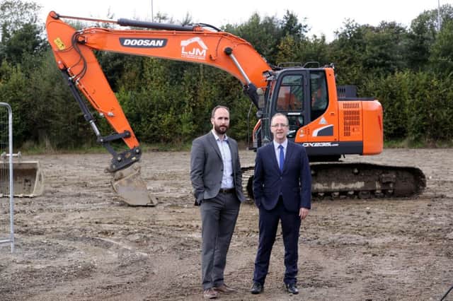 Strabane based food manufacturer, Dragon Brand Foods is investing over half a million in jobs, innovation and a new factory with the support of Invest Northern Ireland. Pictured at the site of the new factory at Strabane Business Park are (L - R) Paul McGuigan, Dragon Brand Foods, and Des Gartland, Invest NI.