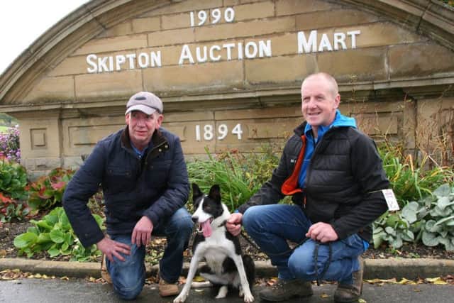 Dean Aitken, right, with his 5,400gns Skipton dog Meg, joined by buyer Malcolm Forster.