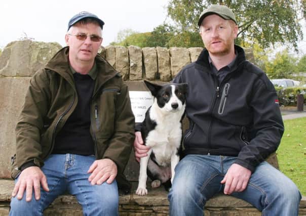 Michael Gallagher, right, with his 9,500gns top price Skipton dog Flo, and buyer Jock Sutherland.