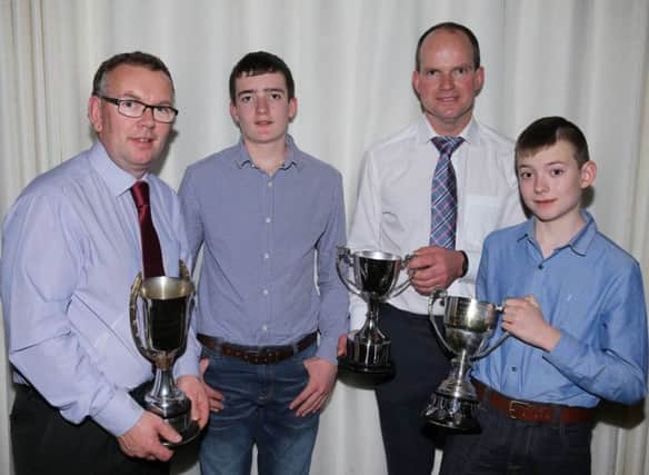Prize winners in the junior section of the annual herds inspectition competition include from left: Stephen Montgomery; George Mitchell, and sons Steven and Alexander. Picture: Kevin McAuley Photography Multimedia