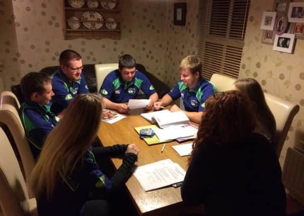 Members from The Glens YFC hard at work preparing for the open night that will be held this Tuesday 21st November in Ballycastle at 8pm